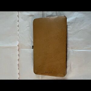 Naturalized leather wallet